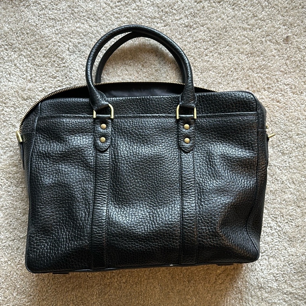 Cole Haan women’s briefcase with handle and shoulder strap. Never used.